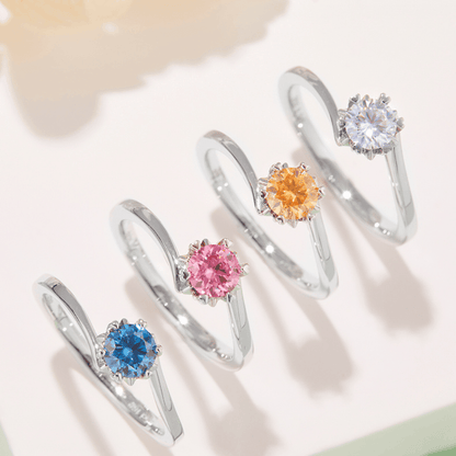 A collection of Flower Moissanite Rings featuring various Moissanite colors set in a delicate floral design.