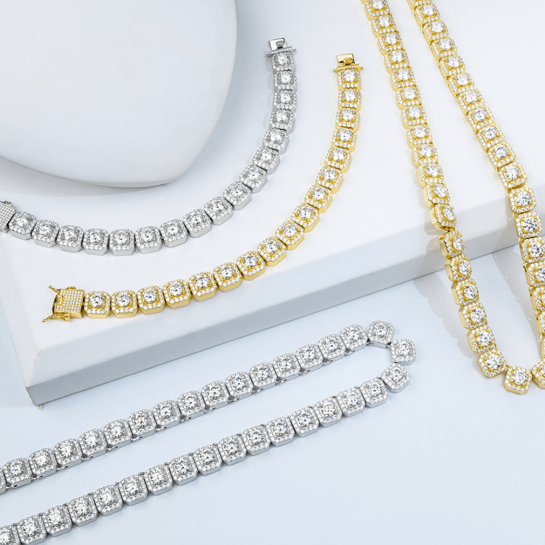 Collection of gold and silver VVS Moissanite Cluster Tennis Necklaces on a white background.