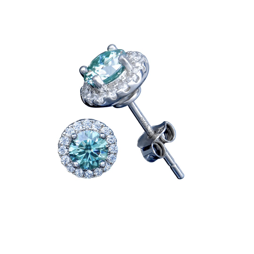 Close-up of Round Brilliant Sea Blue Earrings featuring sea blue gemstones set in sterling silver.