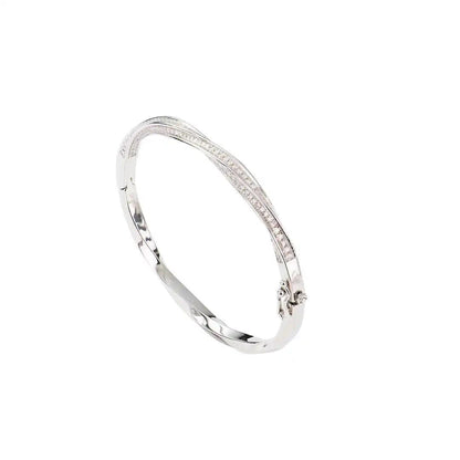 Mozi Mobius Moissanite Bangle featuring a sleek S925 silver design with a Mobius twist and sparkling moissanite stones, displayed against a white background