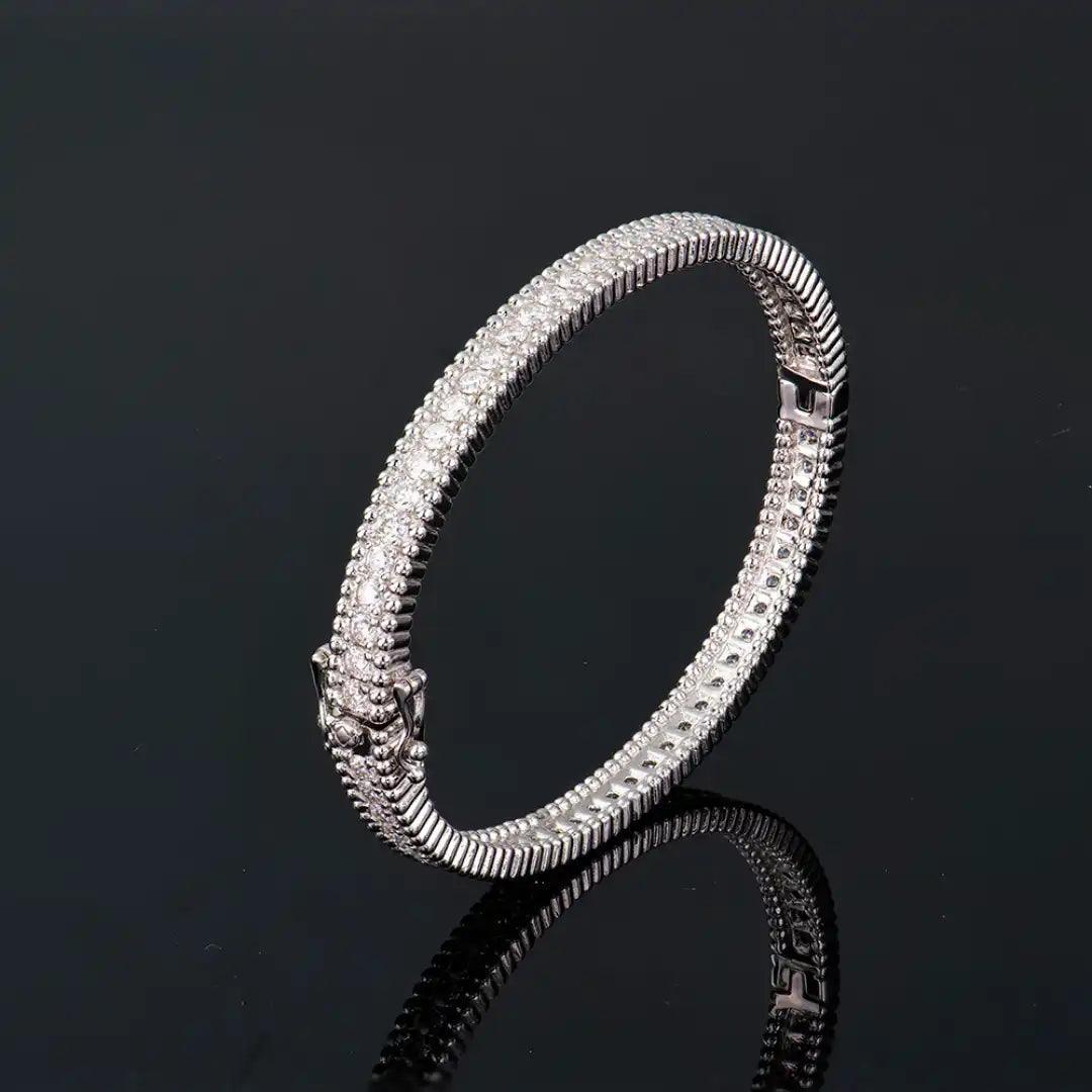 Mozi Celestial Moissanite Bangle in silver with moissanite stones, displayed against a sleek black background