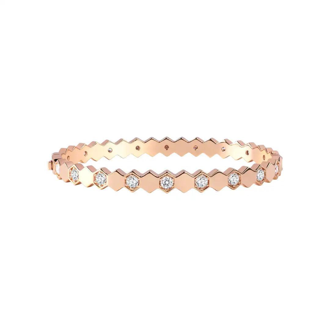 Mozi Beehive Moissanite Bangle featuring a hexagonal gold design with moissanite stones, displayed on a white background