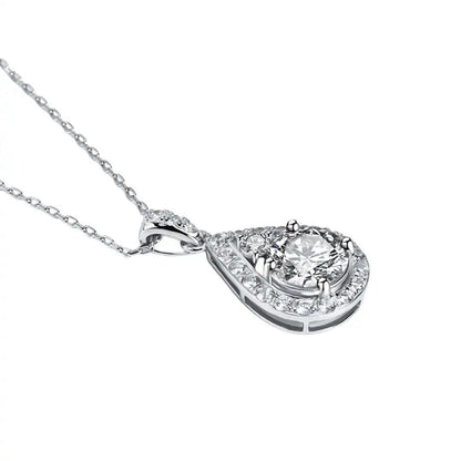 Side view of the Teardrop Moissanite Necklace highlighting the intricate details of the pendant and the brilliance of the round-cut moissanite.