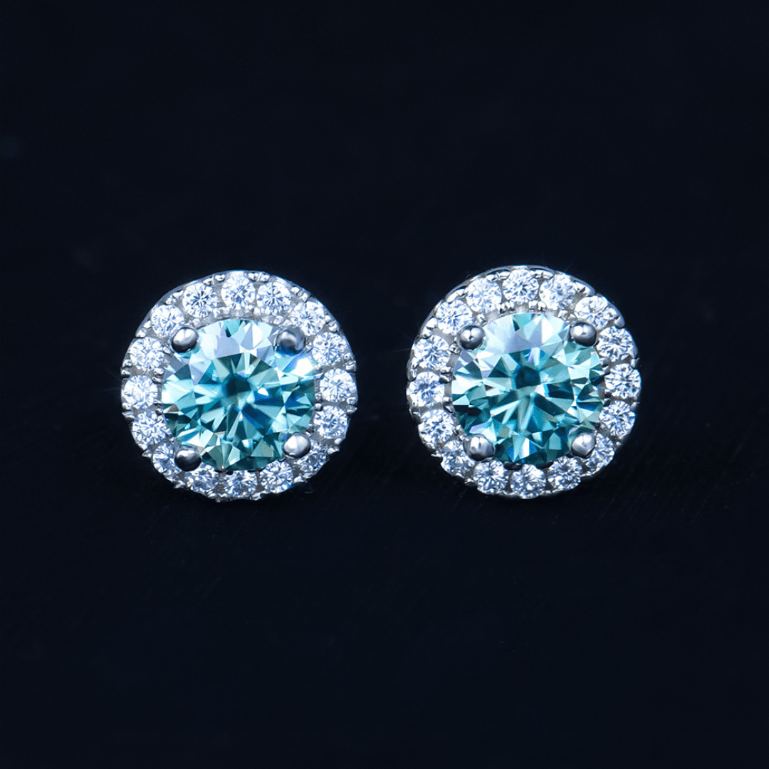 Elegant Round Brilliant Sea Blue Earrings perfect for adding a touch of color to any outfit.