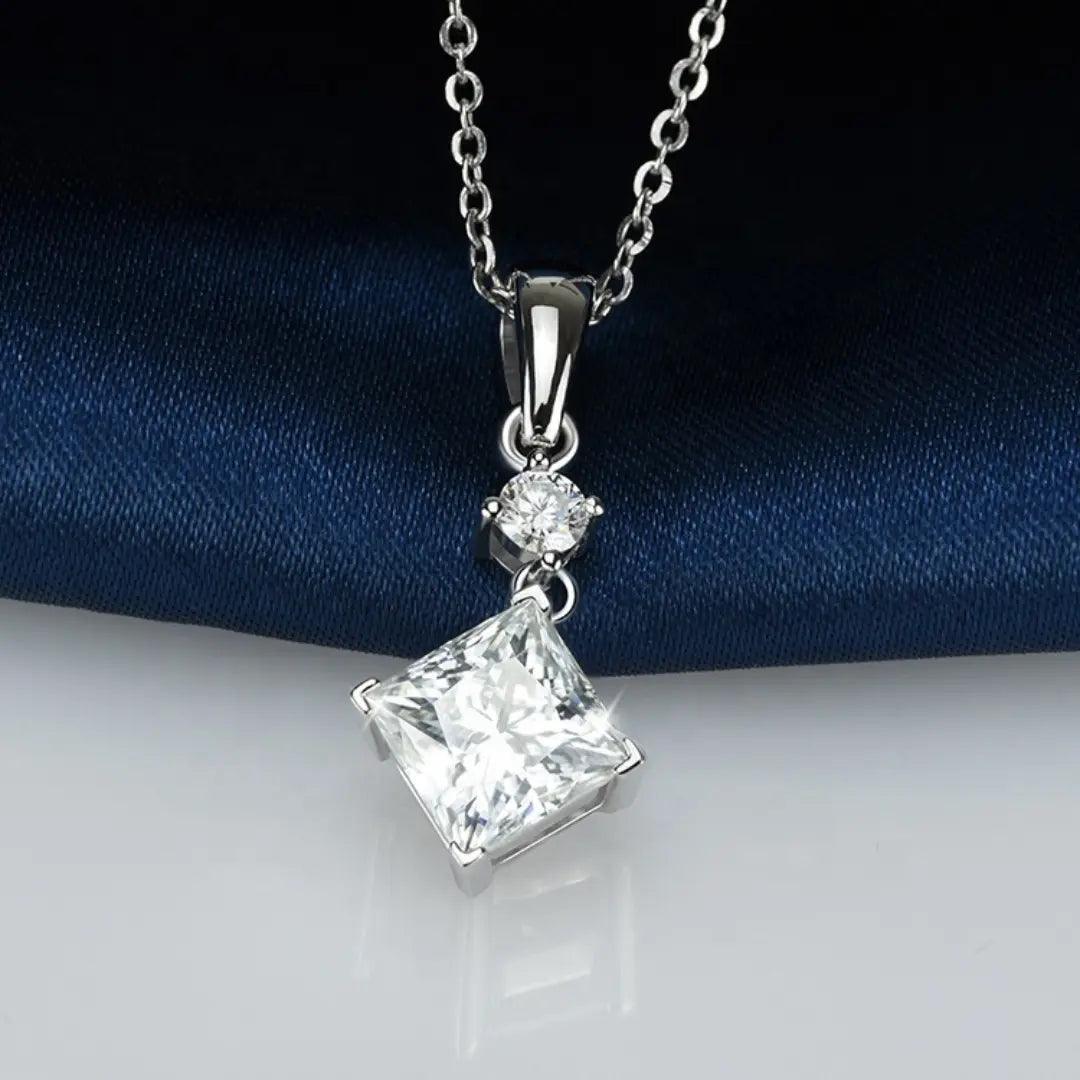 Princess Moissanite Pendant Necklace displayed on a soft background, highlighting the brilliance of the princess-cut gemstone.