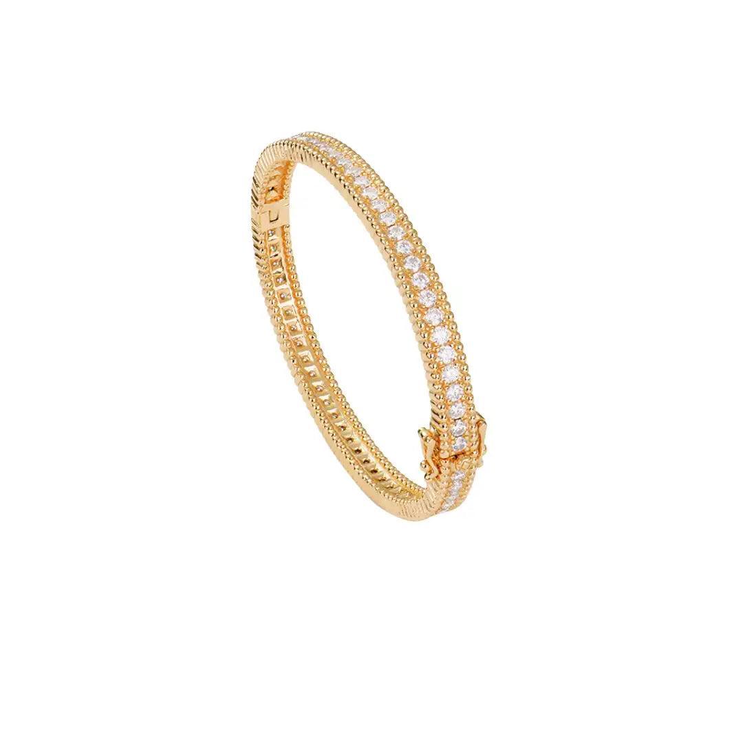 Mozi Celestial Gold Moissanite Bangle in a detailed close-up, showcasing its radiant gold finish and sparkling moissanite stones set along the circular design