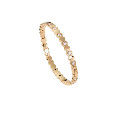 Mozi Beehive Moissanite Bangle displayed on a white background, featuring a hexagonal gold design with moissanite stones