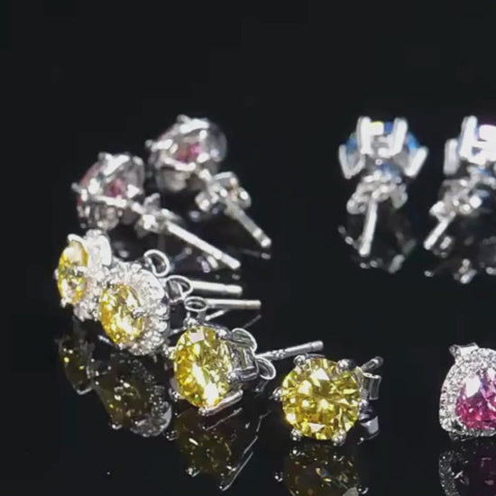 Video showcasing the Pink Heart Earrings, highlighting their heart-shaped pink Moissanite gemstones and sterling silver craftsmanship from various angles.